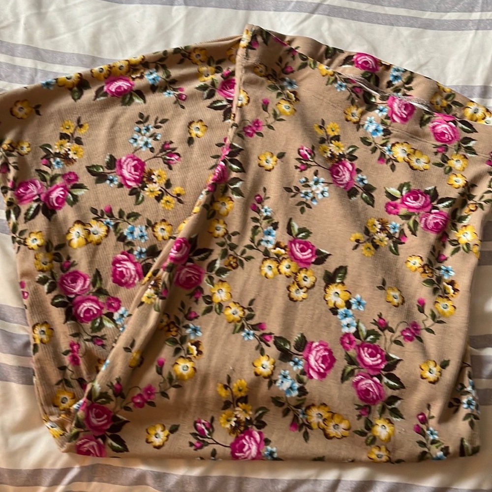 Tan like color base with a floral pattern